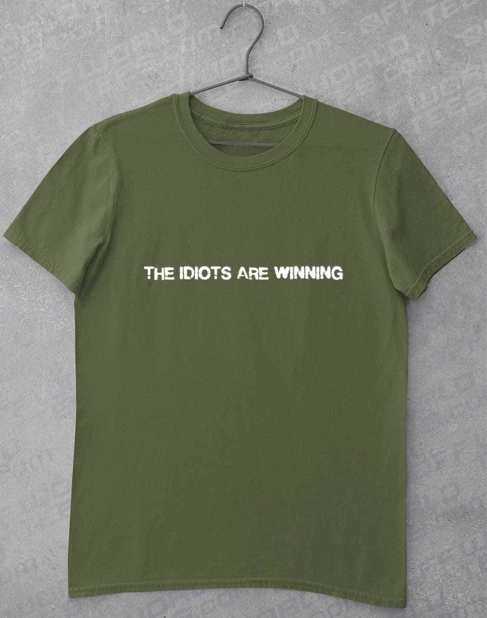 The Idiots Are Winning T-Shirt S / Military Green - Off World Tees