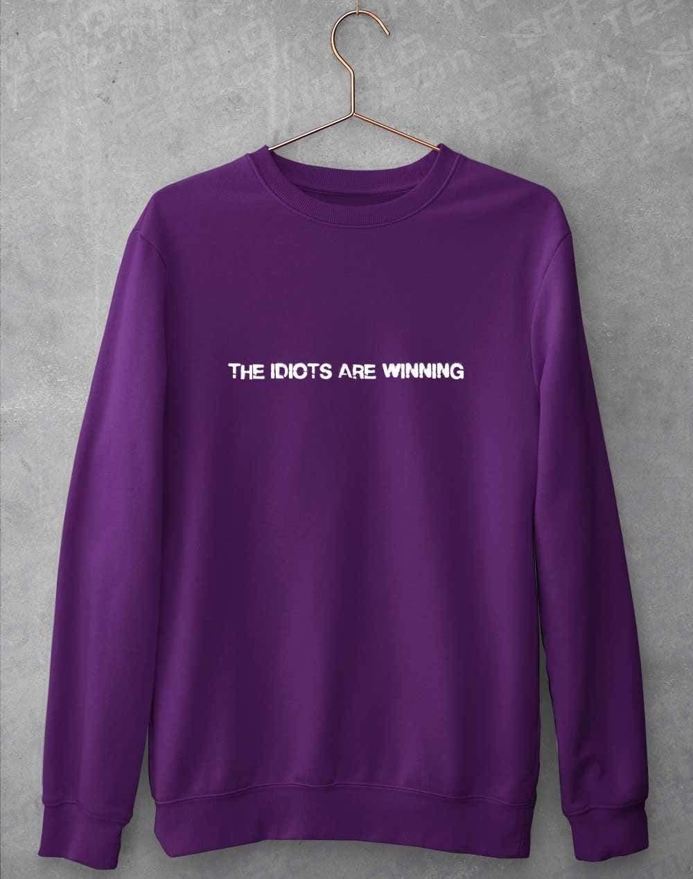 The Idiots Are Winning Sweatshirt S / Purple - Off World Tees